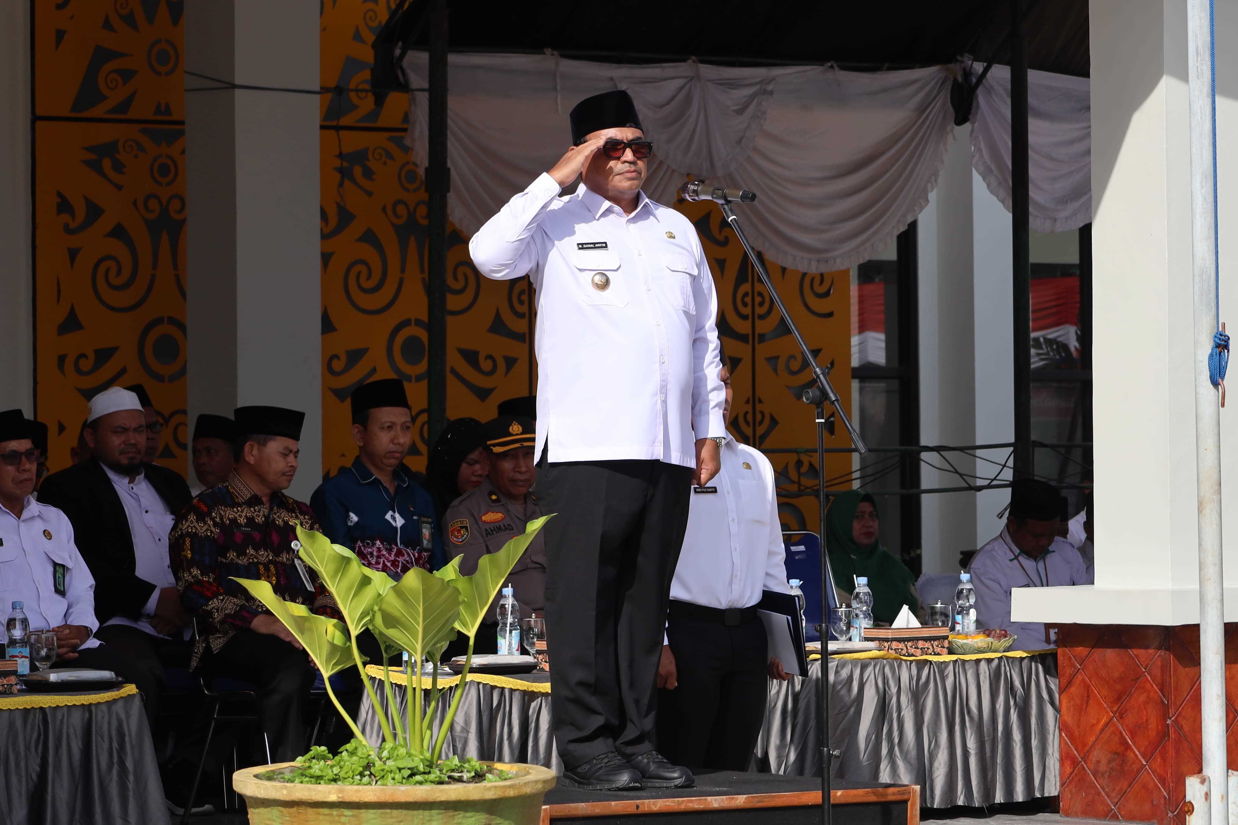Pj. Bupati PPU Membacakan Amanat Menteri Agama RI pada Upacara Hari Amal Bakti Ke-79 Kementerian Agama
